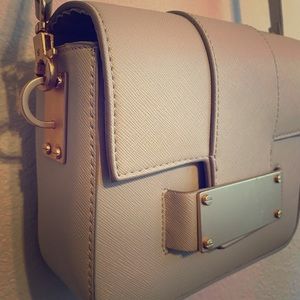 Grey purse with gold accents